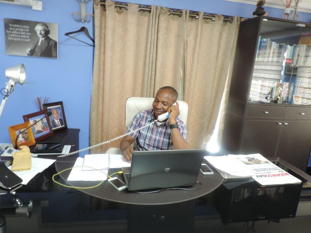 Kola Ayodele attending to the day’s business as GMD for the day (April, 2015)